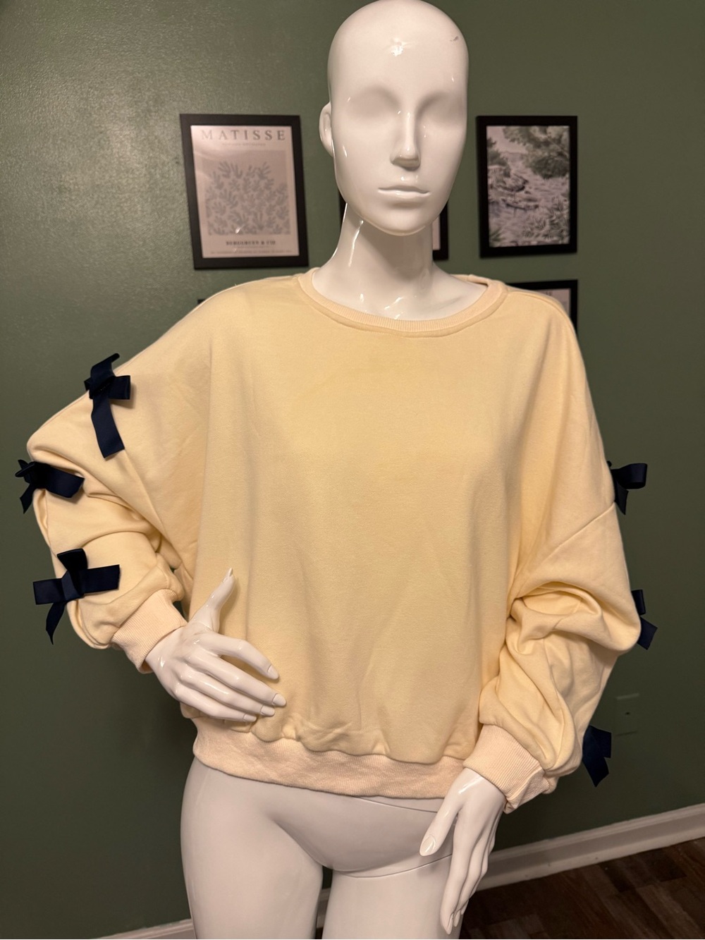 She + Sky Cream Pullover Sweatshirt with Navy Bow Accents